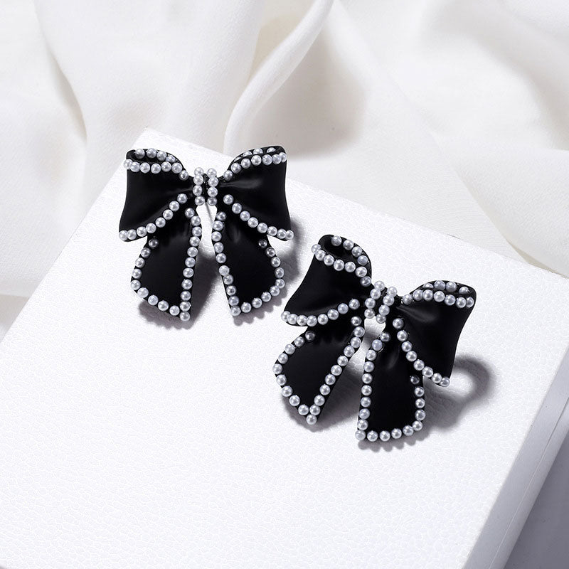 Pearl Embellished Bow Stud Earrings