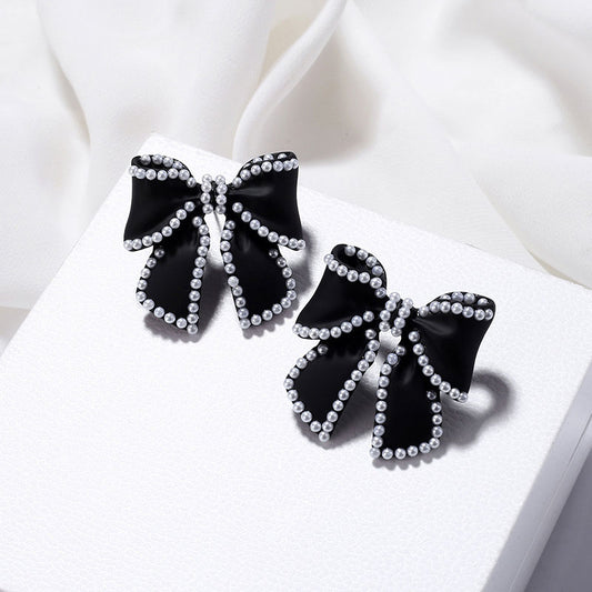 Pearl Embellished Bow Stud Earrings